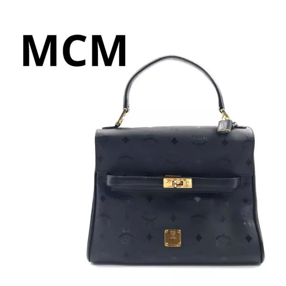 MCM black Monogram Kelly tote like new with lock and key